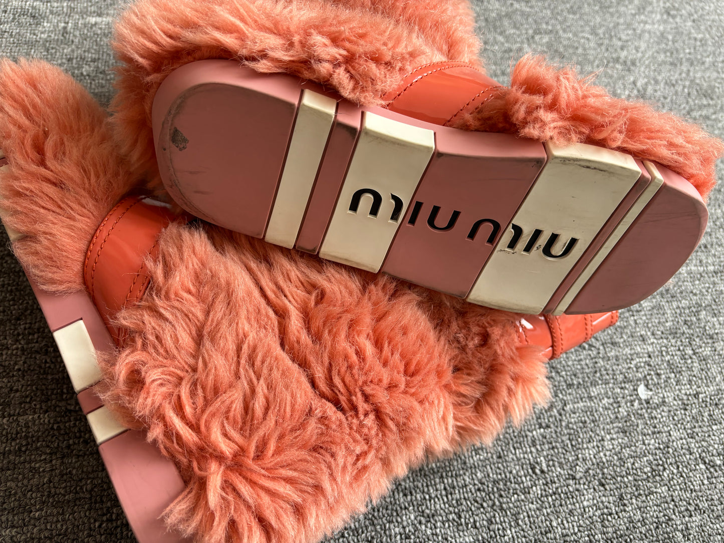 Miu Miu fur strap boots