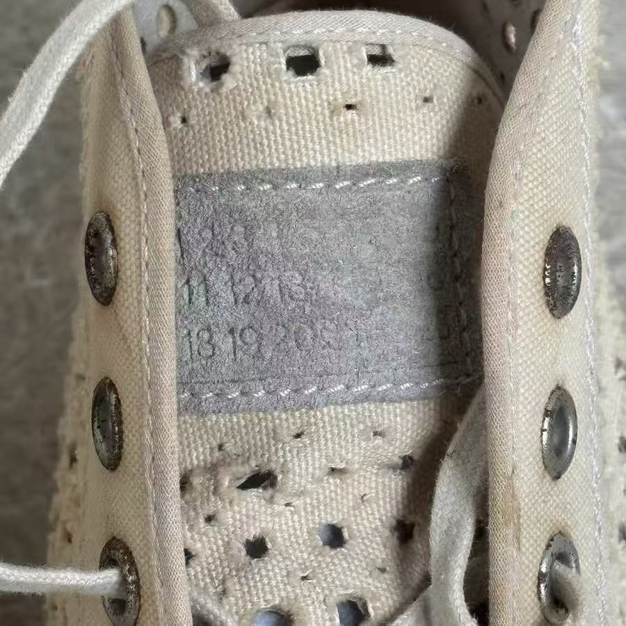 Maison Margiela Perforated Distressed Hi Top Sneaker