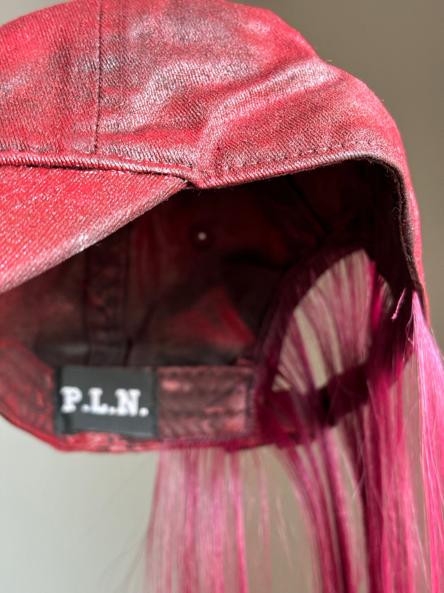 P.L.N.
LONG HAIR CAP (RED)