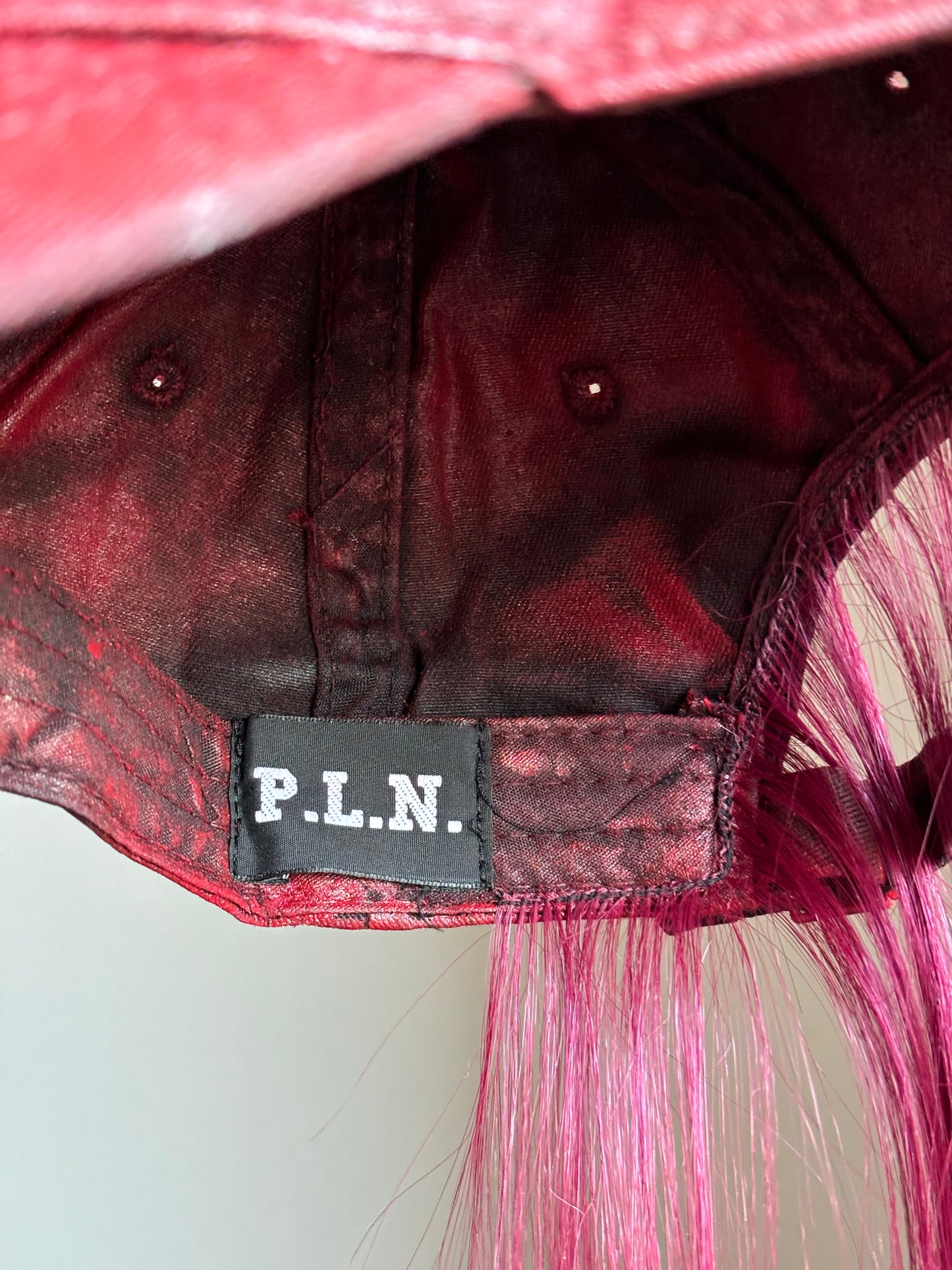 P.L.N.
LONG HAIR CAP (RED)