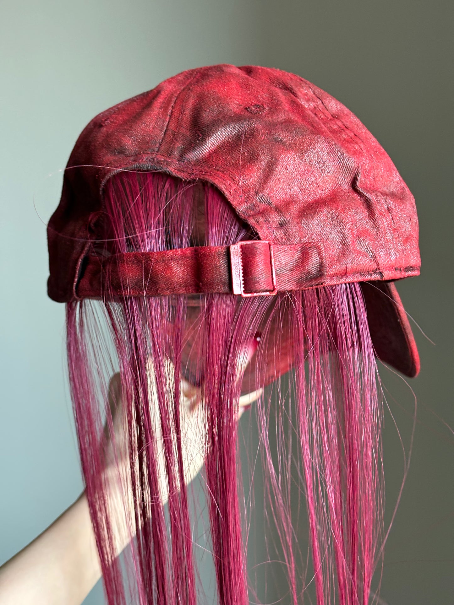 P.L.N.
LONG HAIR CAP (RED)