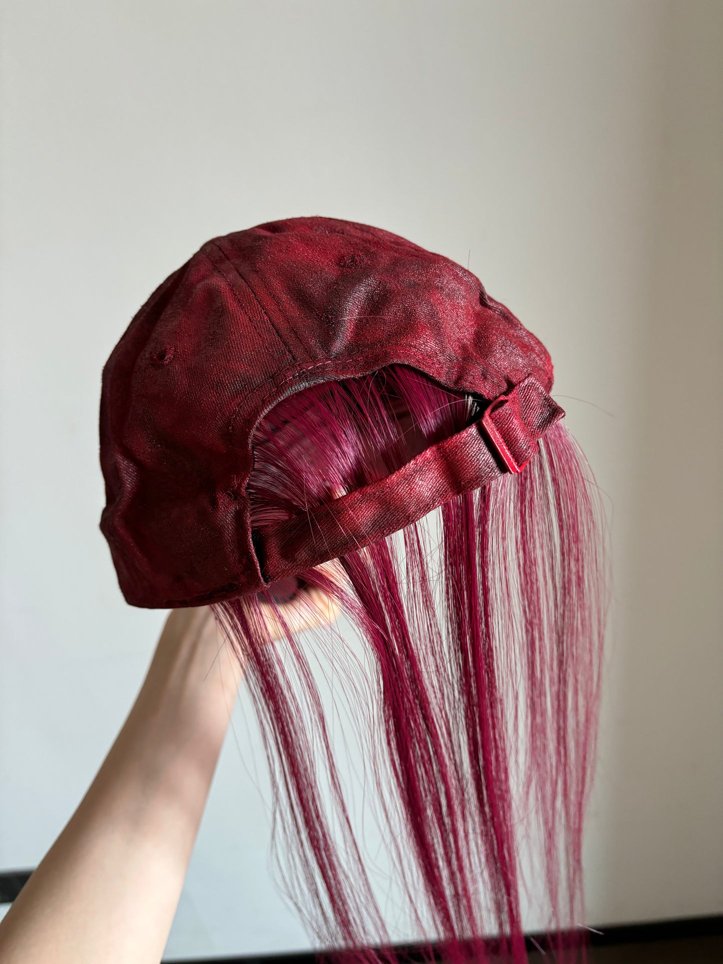 P.L.N.
LONG HAIR CAP (RED)