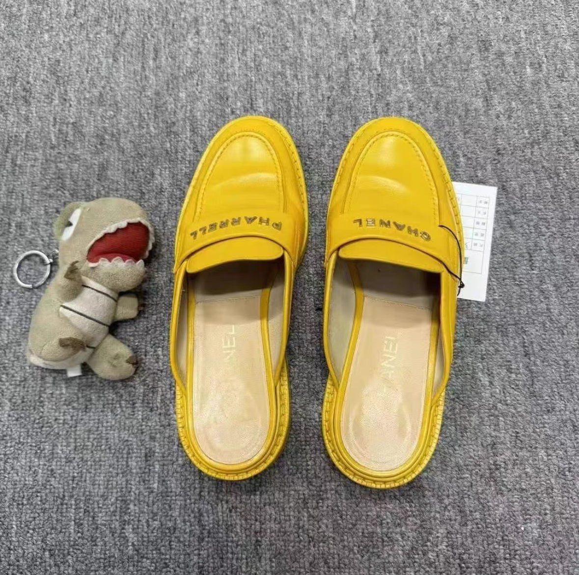 Chanel Yellow Logo Slide Loafers