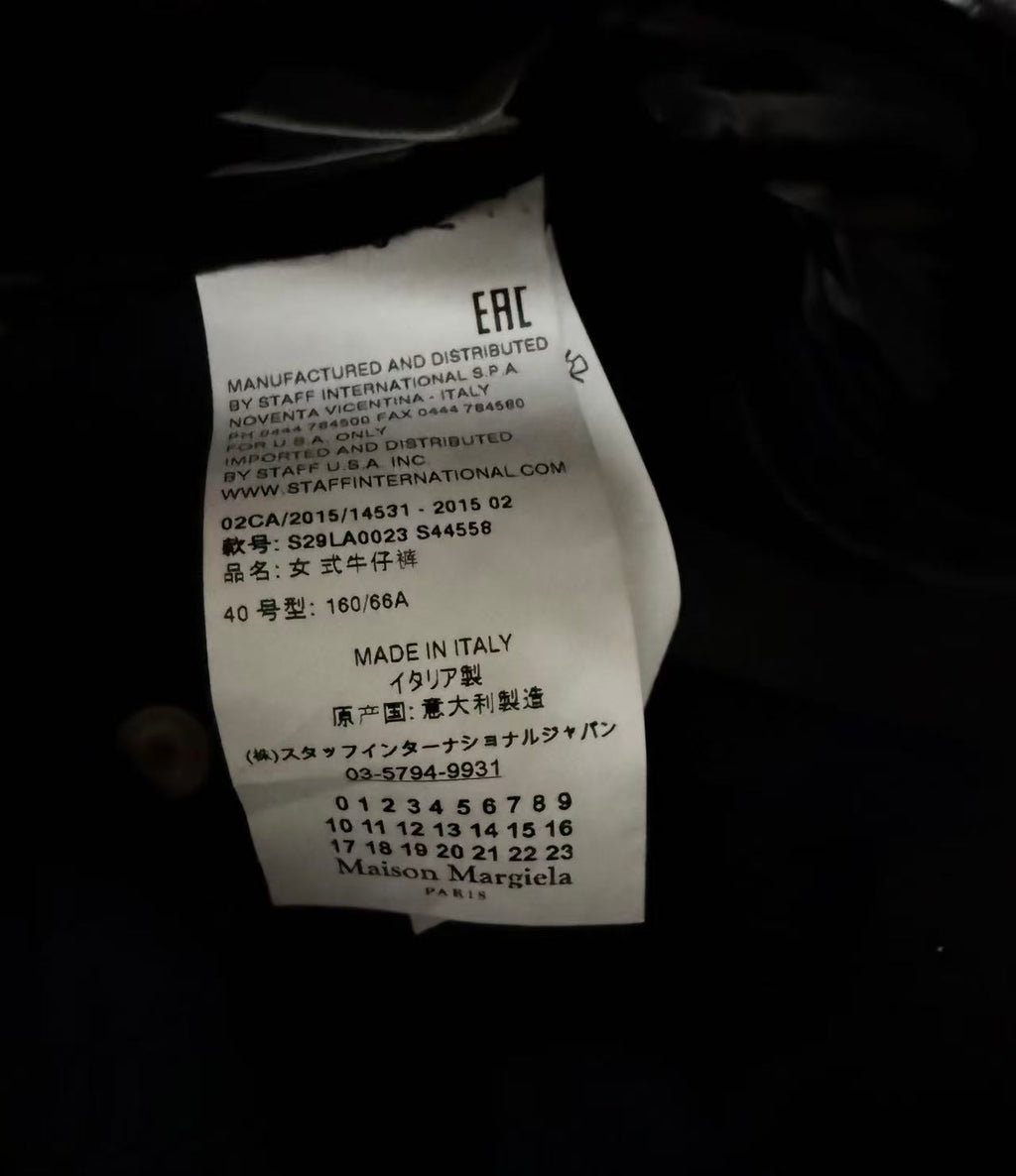 Maison Margiela Coated Shiny Black Slim Jeans